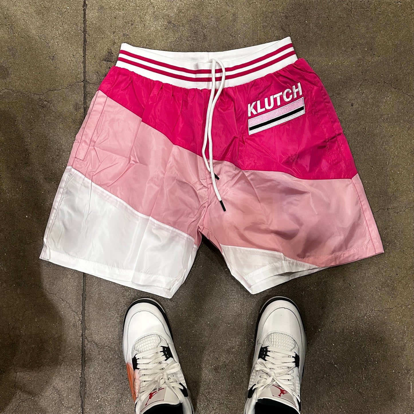 RETRO WINDBREAKER SHORTS [PINK]